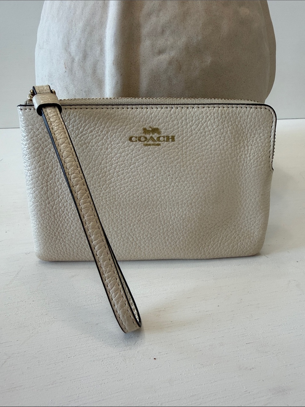 Coach Cream Pebbled Leather Wristlet with Gold Logo